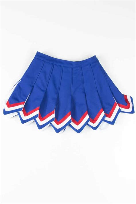 Skirt features a knife-pleat style with a button and zipper closure for easy. . Gladiator cheer skirt